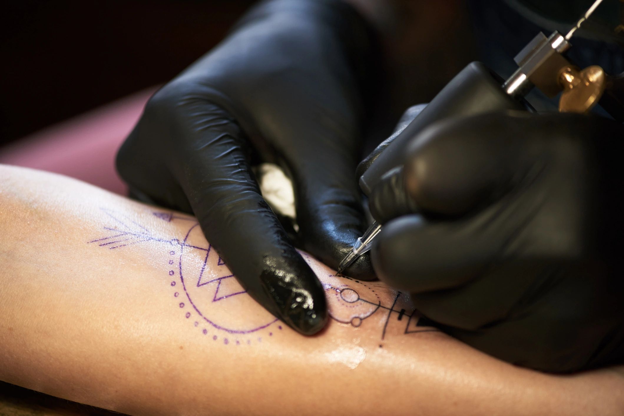 tattoo artist at work